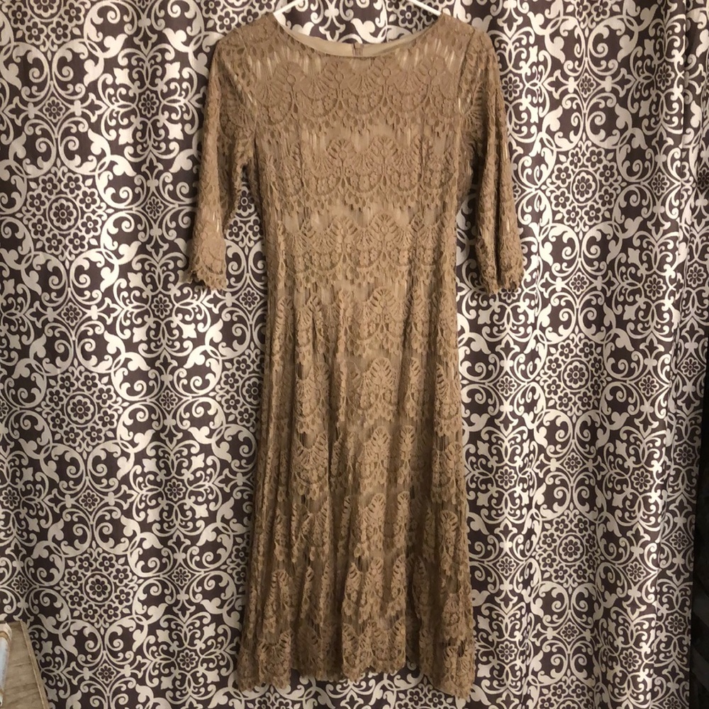Good used condition. Dainty Jewel’s dress size small.